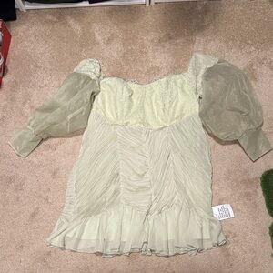 Elegant Light Green Dress with Lace Details